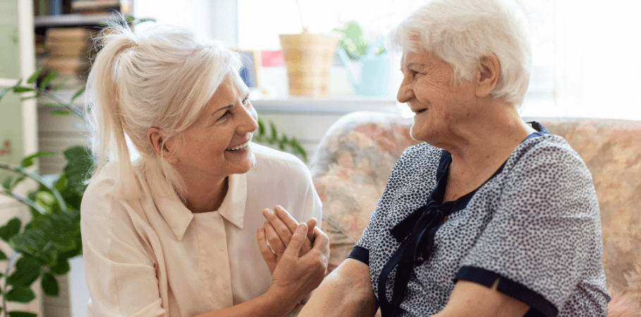 Elderly woman speaking to her daughter