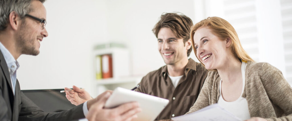 couple discussing trust and estates with attorney