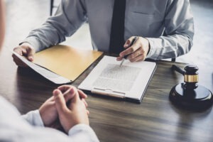 Closeup of a divorce lawyer in Loudoun County speaking with a client.