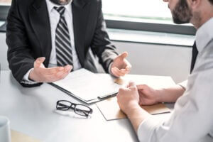 Closeup view of a divorce modification lawyer in Fairfax, speaking with a client.