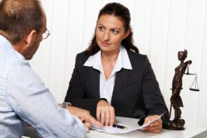 A divorce modification lawyer in Virginia Beach, speaking with a client.