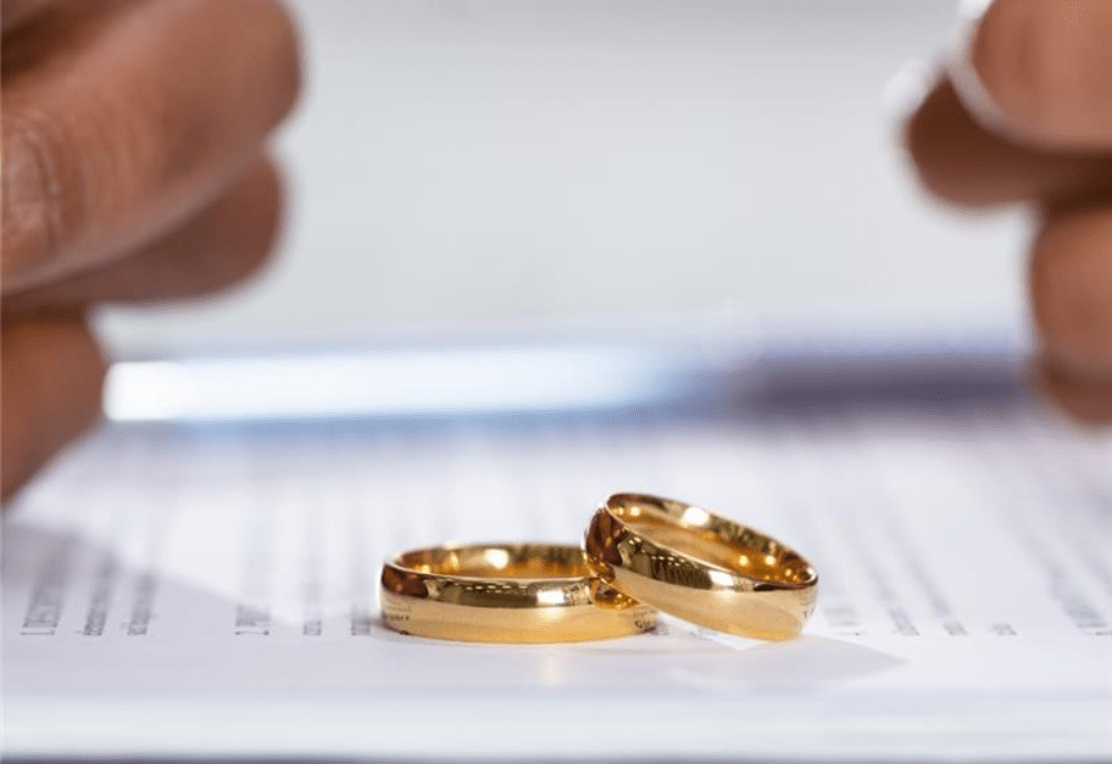 Two Rings on top of Divorce Paperwork | Divorce Attorneys